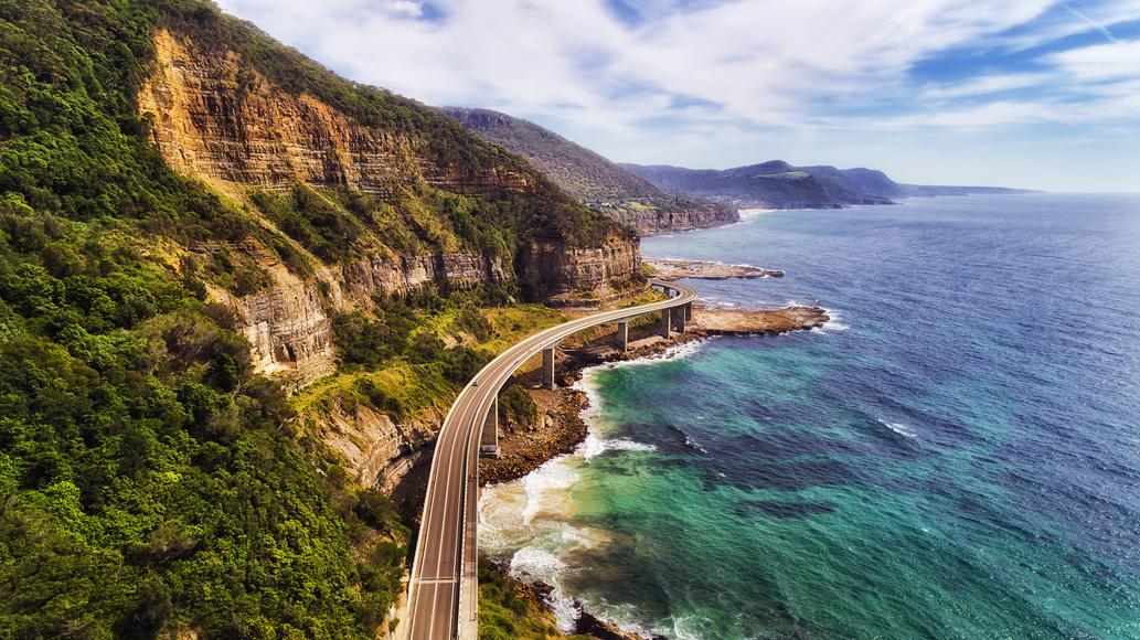 Scenic Pacific Coast Highway in California, one of the cool places to visit in USA along the ocean cliffs.